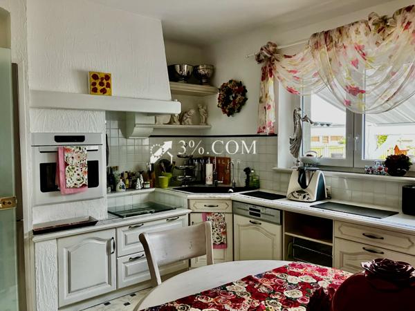 Maison 7 pièce(s) 4 chambre(s) 190 m²