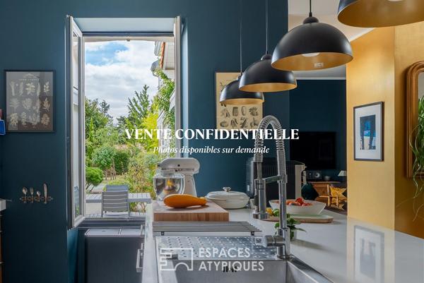 Maison de charme en plein bourg avec vie de plain pied, garage et ravissant jardin.