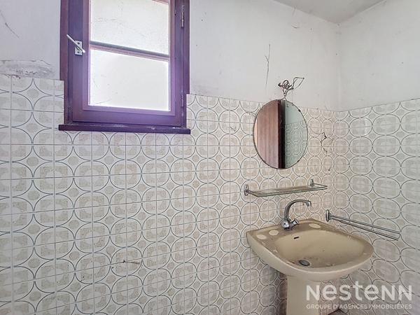 À vendre : Maison à rénover de 148 m² avec garage de 62 m² et grenier de 73 m², située au centre de Condom