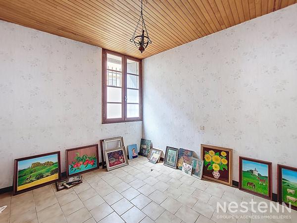 À vendre : Maison à rénover de 148 m² avec garage de 62 m² et grenier de 73 m², située au centre de Condom