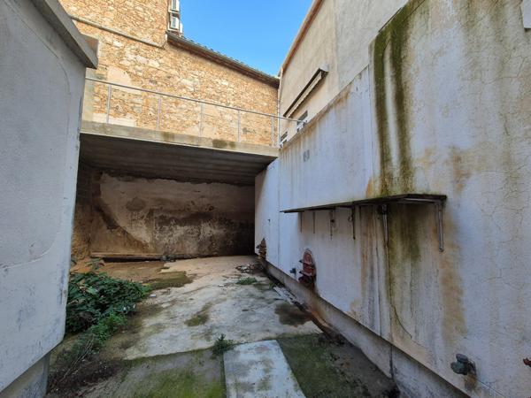 Maison de village avec extérieur et grand garage !