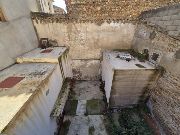 Maison de village avec extérieur et grand garage !