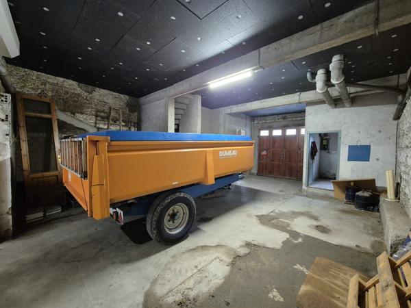 Maison de village avec extérieur et grand garage !