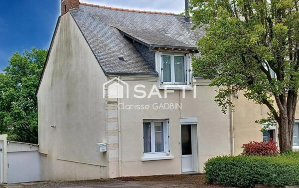 Maison avec 2 chambres , un garage et terrain clos