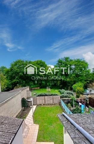 Maison avec 2 chambres , un garage et terrain clos