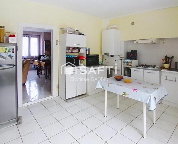 Maison avec 2 chambres , un garage et terrain clos