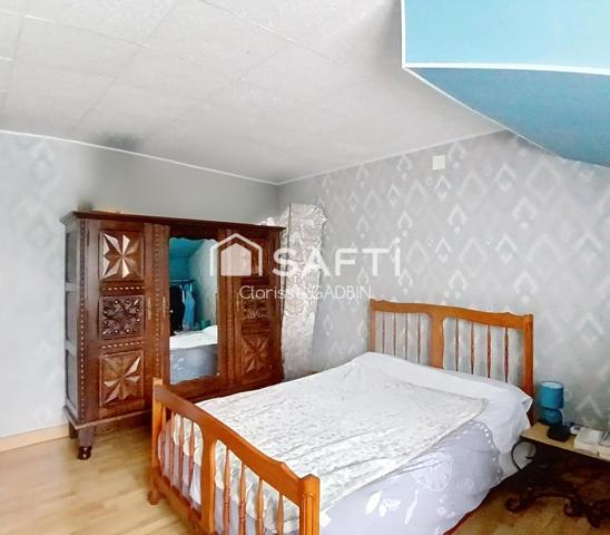 Maison avec 2 chambres , un garage et terrain clos