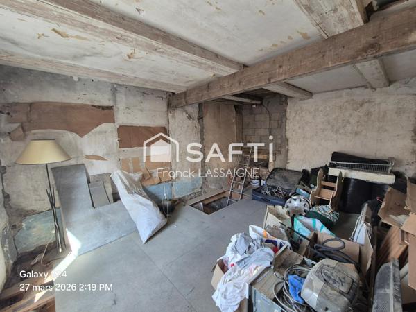 Immeuble avec appartements, caves et garages