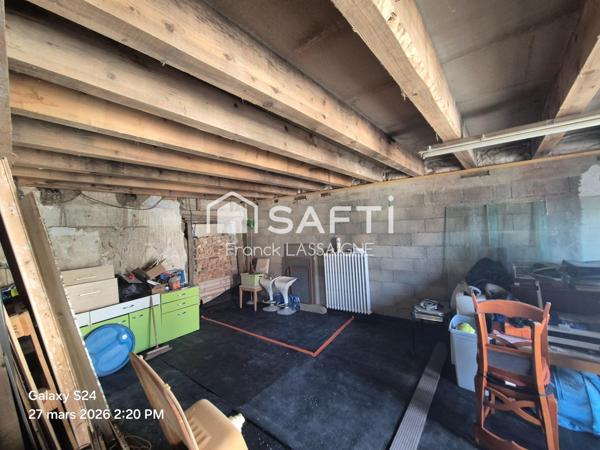 Immeuble avec appartements, caves et garages