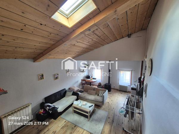 Immeuble avec appartements, caves et garages