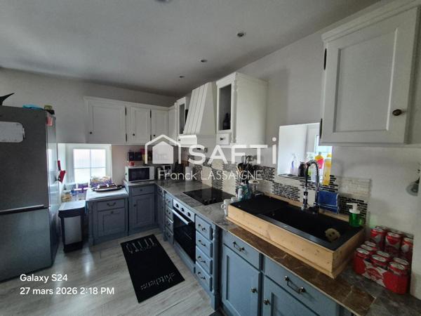 Immeuble avec appartements, caves et garages