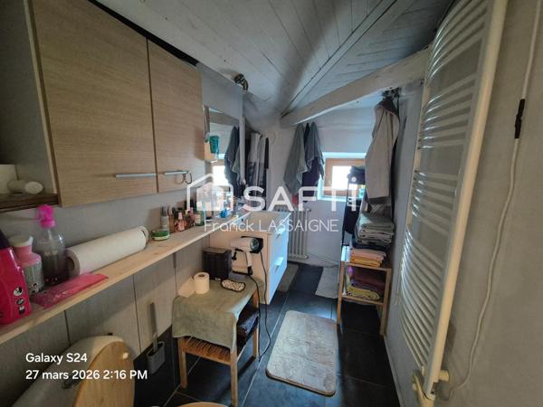 Immeuble avec appartements, caves et garages