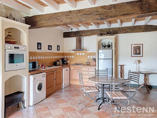 A Vendre Maison en pierre rénovée de 295 m² avec gîte, parc arboré, piscine et 550 m² de dépendances