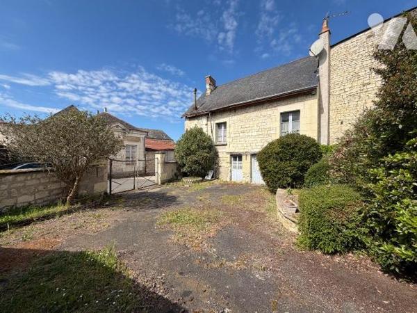 En plein coeur de Marçay, ensemble immobilier à fort potentiel à rénover, sur un terrain d'envi...