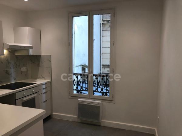 Dpt Paris (75), à louer PARIS 14EME ARRONDISSEMENT GRAND STUDIO 34 m²