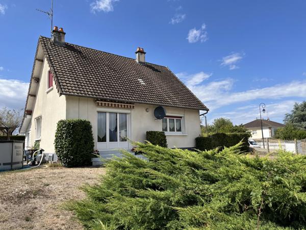 Maison familiale avec jardin, garage et sous-sol