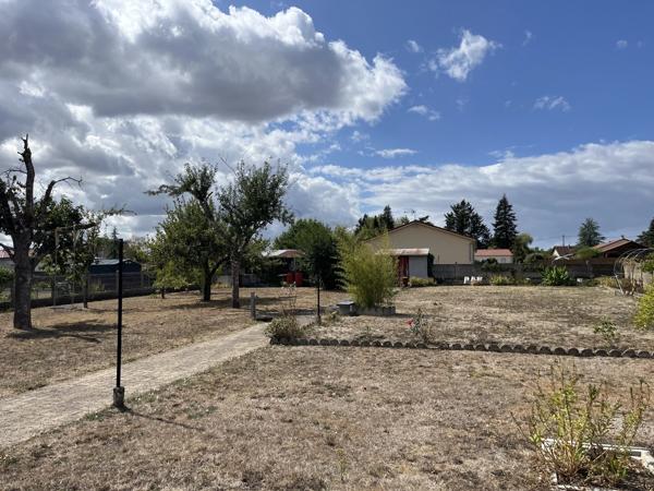 Maison familiale avec jardin, garage et sous-sol