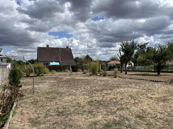 Maison familiale avec jardin, garage et sous-sol