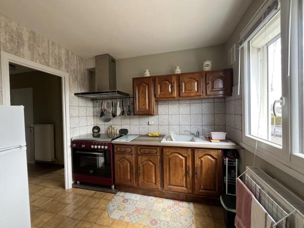 Maison familiale avec jardin, garage et sous-sol