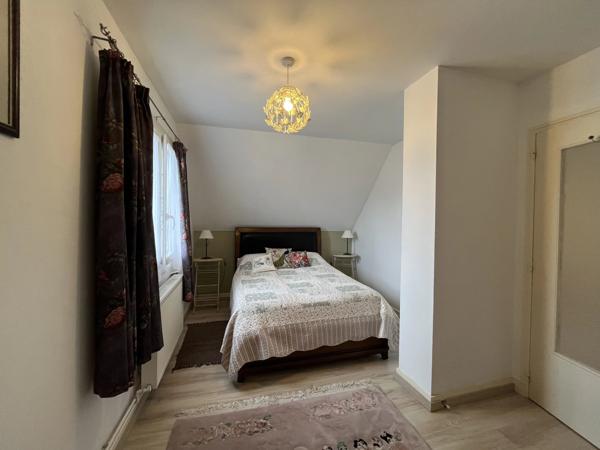 Maison familiale avec jardin, garage et sous-sol