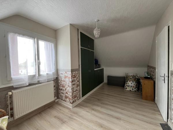 Maison familiale avec jardin, garage et sous-sol