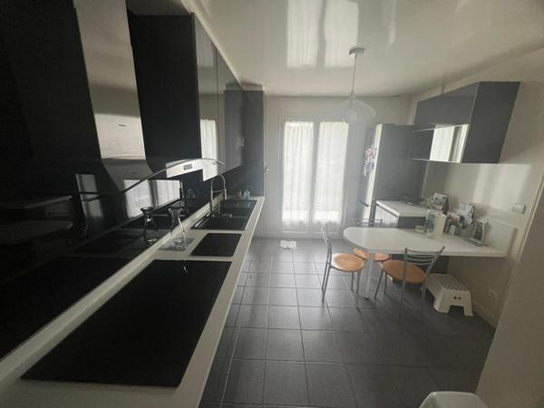 DRANCY CENTRE - pavillon 122 m² 3 chambres - séjour 50 m² - sous-sol et terrain de 480 m²