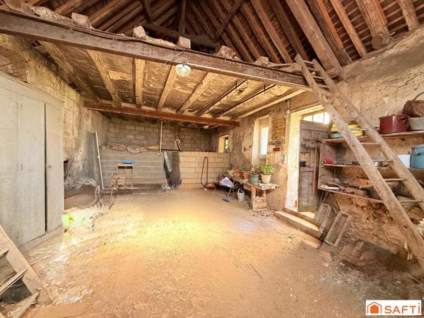 Maison de bourg et sa grange