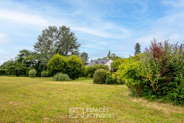 Maison dans son parc avec vie de plain-pied