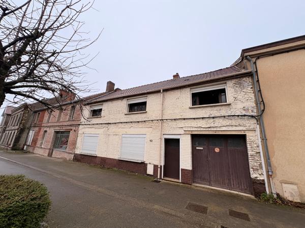 Maison 4 chambres, un garage et un jardin