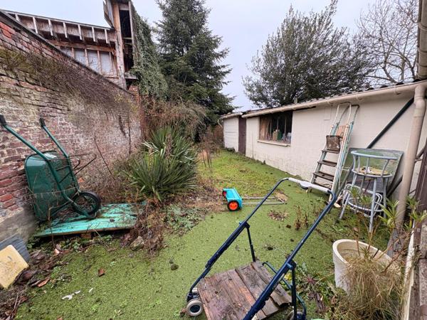 Maison 4 chambres, un garage et un jardin