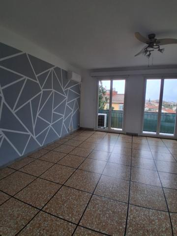 T4 traversant avec climatisation, balcon, cave et garage