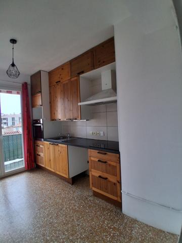 T4 traversant avec climatisation, balcon, cave et garage