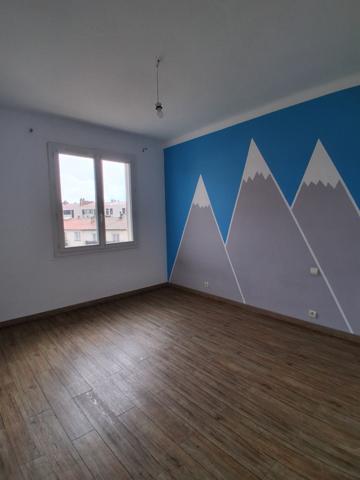 T4 traversant avec climatisation, balcon, cave et garage