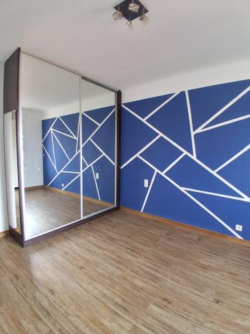 T4 traversant avec climatisation, balcon, cave et garage