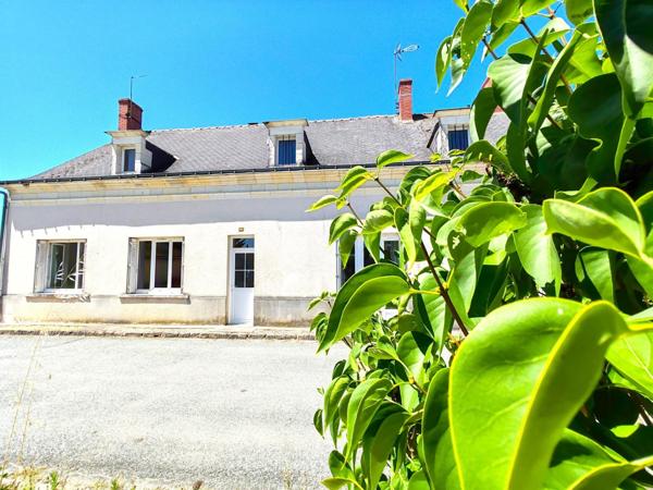 Opportunité ! Maison composée de deux logements en centre-ville, avec jardin, appentis et terrain.