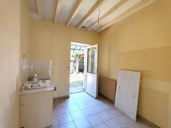 Opportunité ! Maison composée de deux logements en centre-ville, avec jardin, appentis et terrain.