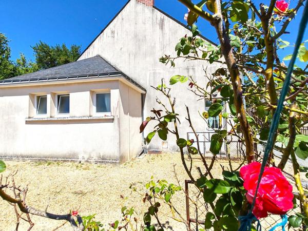 Opportunité ! Maison composée de deux logements en centre-ville, avec jardin, appentis et terrain.