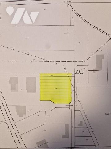 Une parcelle de terre, destinée à la construction d'un local à usage professionnel, située sur ...