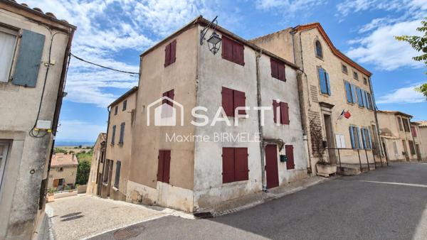 Ensemble immobilier : Maison + grange + terrain en zone constructible