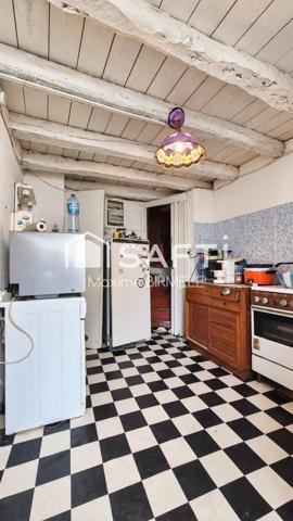 Ensemble immobilier : Maison + grange + terrain en zone constructible
