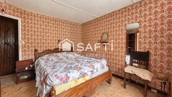 Ensemble immobilier : Maison + grange + terrain en zone constructible