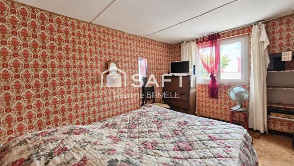 Ensemble immobilier : Maison + grange + terrain en zone constructible