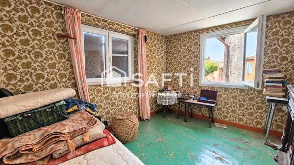 Ensemble immobilier : Maison + grange + terrain en zone constructible
