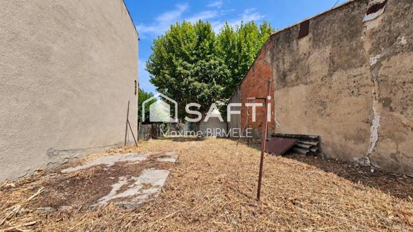 Ensemble immobilier : Maison + grange + terrain en zone constructible