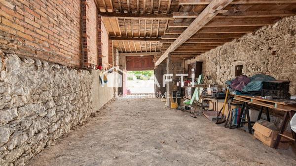 Ensemble immobilier : Maison + grange + terrain en zone constructible