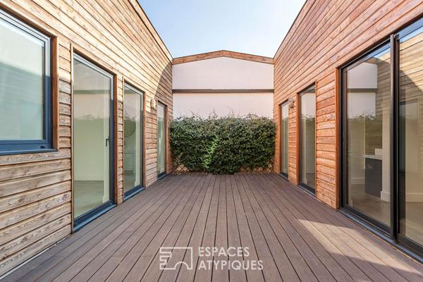 Loft intimiste rénové avec patio et garage