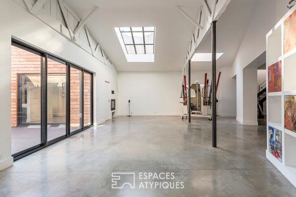 Loft intimiste rénové avec patio et garage