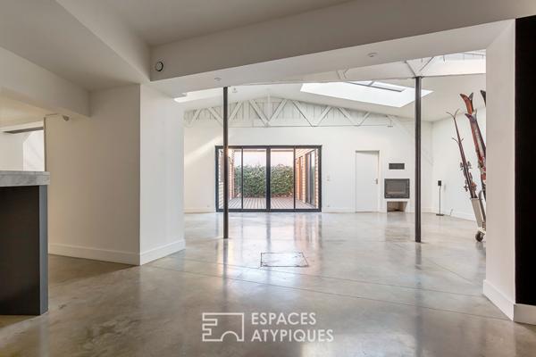 Loft intimiste rénové avec patio et garage