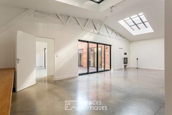 Loft intimiste rénové avec patio et garage
