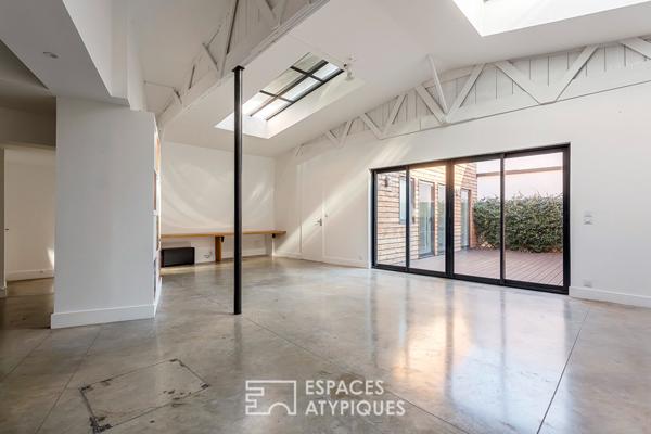 Loft intimiste rénové avec patio et garage